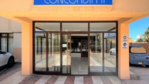 The entrance to a building with a blue sign reading "CONCORDIA II".