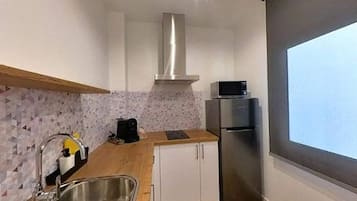 Apartment | Private kitchen | Electric kettle, toaster, high chair