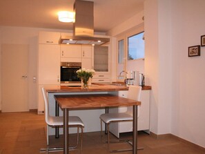 Apartment | Private kitchen | Oven, electric kettle, toaster