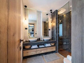Villa | Bathroom | Bathtub, hair dryer