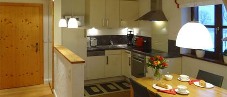 Apartment | Private kitchen | Oven, electric kettle, toaster