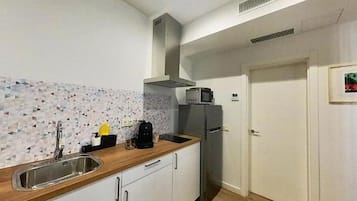 Apartment | Private kitchen | Electric kettle, toaster, high chair