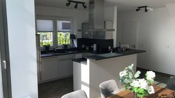 Apartment | Private kitchen | Oven, toaster, highchair