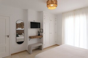 Premium bedding, down comforters, memory foam beds, minibar