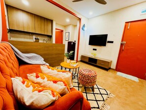 40-inch LED TV with cable channels - Home Escape 1BHK Retreat Nr Saket Square (Indore)