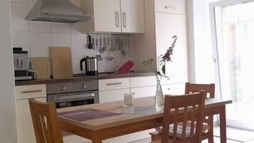 Apartment | Private kitchen | Oven, electric kettle, toaster