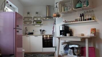 Apartment | Private kitchen | Oven, electric kettle, toaster