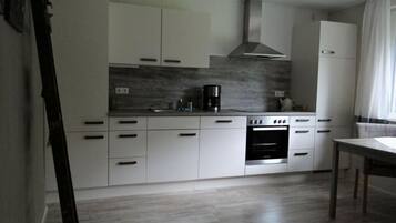 Apartment | Private kitchen | Oven, electric kettle, toaster