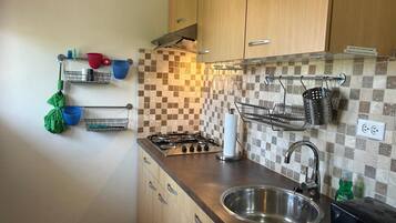 Fridge, stovetop, dining tables