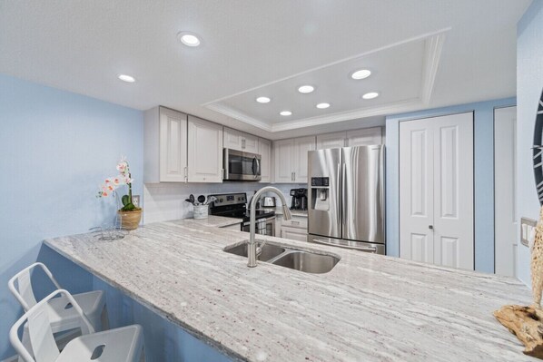 Fridge, microwave, oven, stovetop