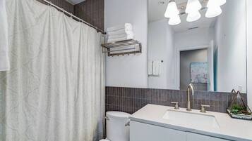 Shower, hair dryer, towels