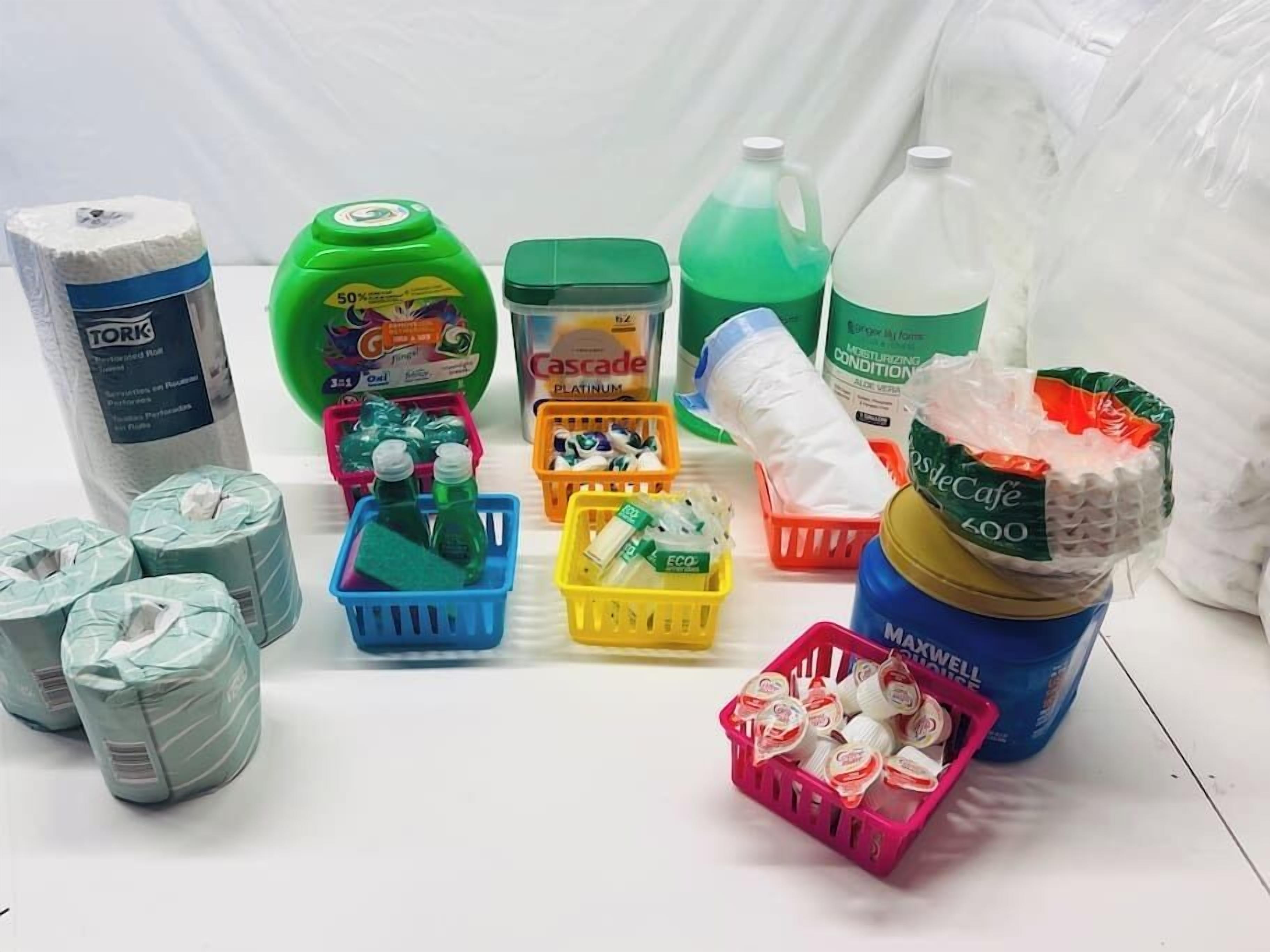 A variety of cleaning supplies including paper towels, dish soap, and personal care items.