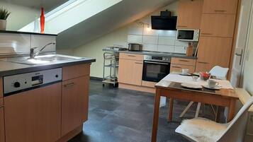 Apartment | Private kitchen | Oven, electric kettle, toaster