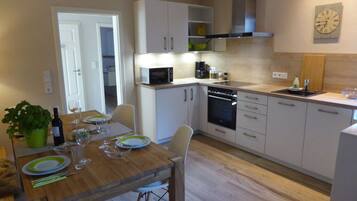 Apartment | Private kitchen | Oven, electric kettle, toaster