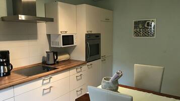 Apartment | Private kitchen | Oven, electric kettle, toaster