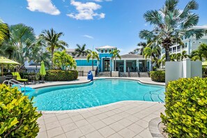 A heated pool - Sunset FantaSea at One Particular Harbour 380-202 · Sound Views · 3BR (Bradenton)