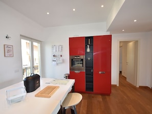 Apartment | Private kitchen | Microwave, dishwasher, coffee/tea maker - Apartment in a Prime Location on Lake Maggiore (Verbania)