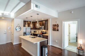 Apartment, 2 Bedrooms | Private kitchen | Fridge, oven, coffee/tea maker, electric kettle