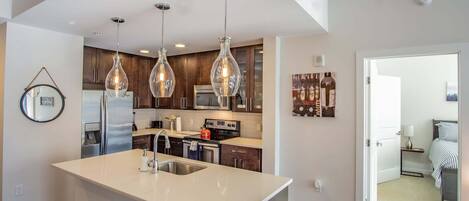 Apartment, 2 Bedrooms | Private kitchen | Fridge, oven, coffee/tea maker, electric kettle