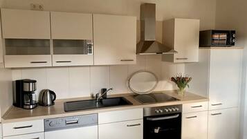 Apartment | Private kitchen | Oven, electric kettle, toaster