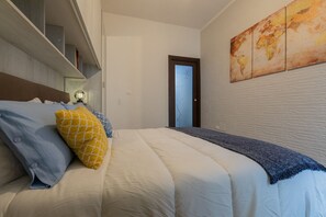 Fer et planche à repasser, Wi-Fi gratuit, draps fournis