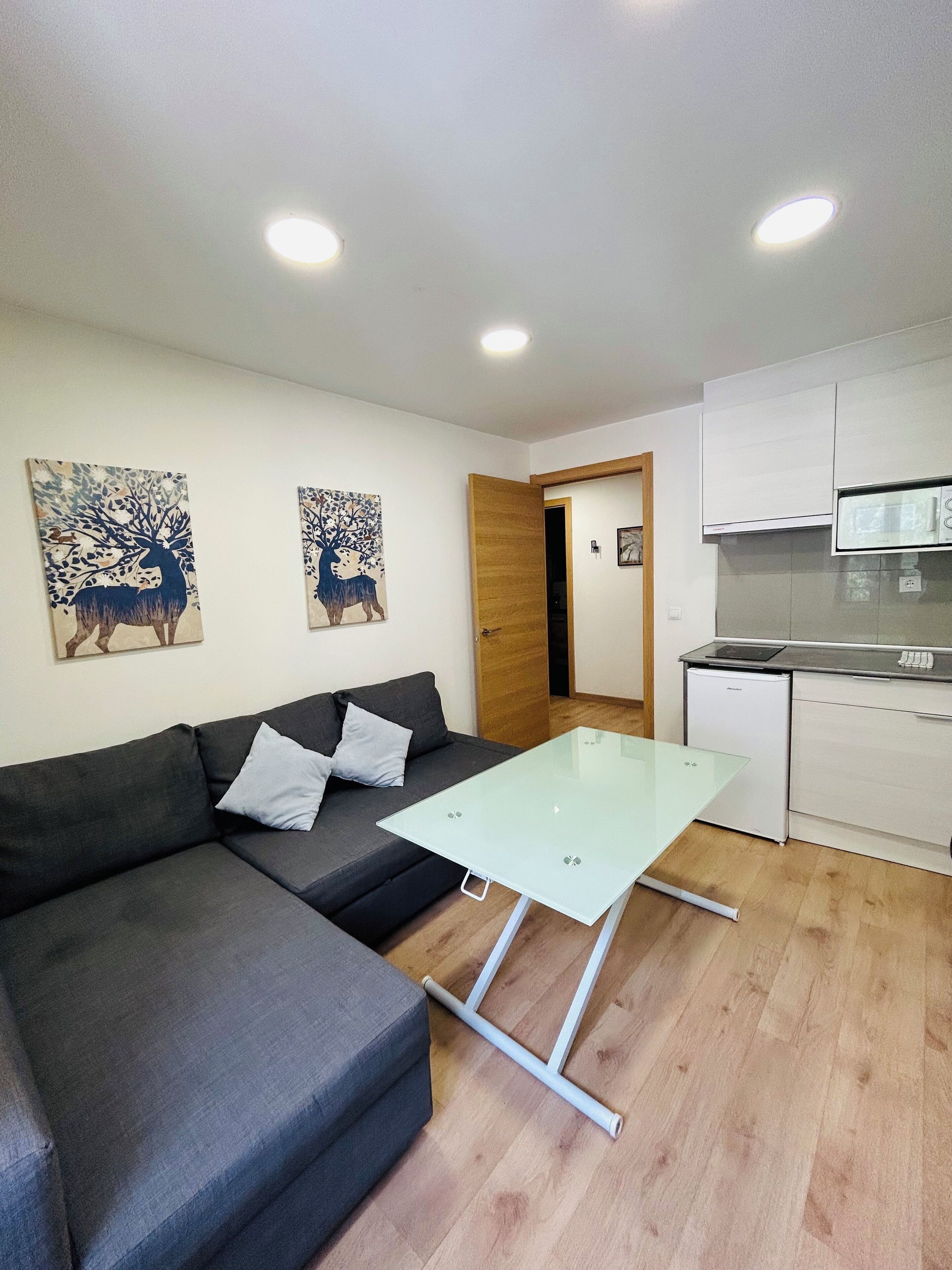 Family Apartment, Mountain View | Living area | 27-inch flat-screen TV with digital channels