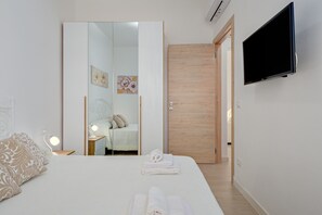 1 habitación, tabla de planchar con plancha, wifi gratis y ropa de cama 