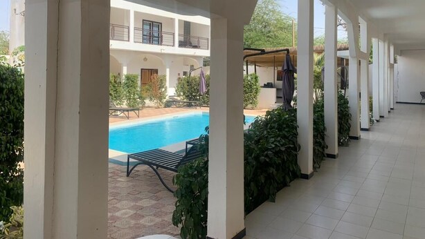 Comfort Room, Pool View | Laptop workspace, WiFi (free), individually decorated - Hôtel Camille (Nguekhokhe)