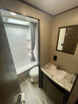 Hair dryer, towels, soap, toilet paper