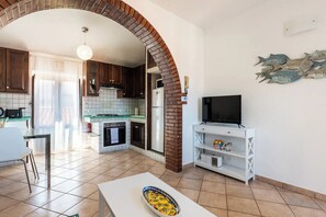 Apartamento | Cozinha privada | Geladeira, micro-ondas, fogão, cooktop