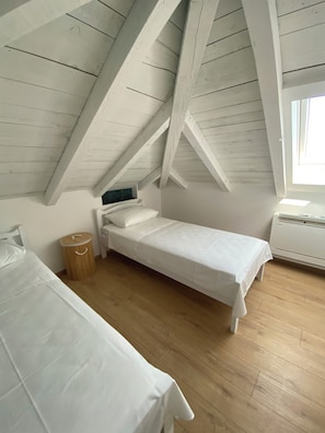 2 dormitorios, tabla de planchar con plancha, wifi y ropa de cama