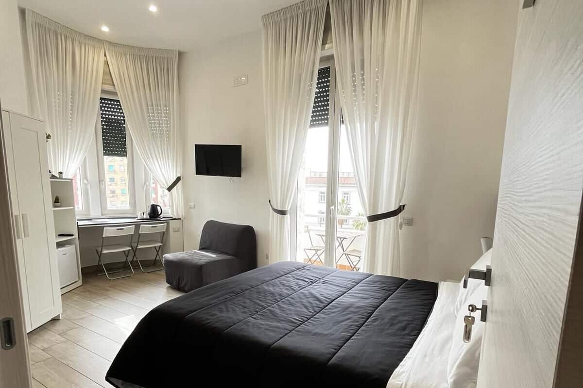 Classic Triple Room, Balcony, City View | Iron/ironing board, free WiFi