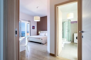 2 habitaciones, tabla de planchar con plancha, cuna de viaje y wifi