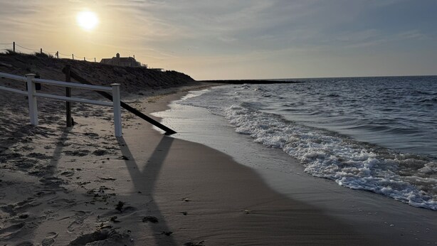 A beach path with a railing, leading to the sea. - Charming Cape Cod house in Dennis Massachusetts. Pets Friendly! (Dennis)
