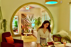Signature Apartment, Balcony, Ground Floor | Living area | 55-inch flat-screen TV with cable channels - 610atMiramar (San Juan)