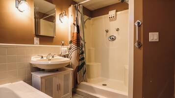 Jetted tub, hair dryer, towels, soap