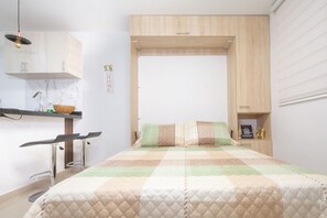 Departamento básico | 2 habitaciones, wifi gratis y ropa de cama 