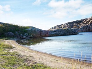 A natural landscape with a river, rocky terrain, and vegetation. - 4 Star Holiday Home in Hamburgsund (Hamburgsund)