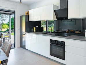 Private kitchen - Lotta Comfortable Holiday Residence (Rasa)