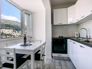 Appartement | Cuisine privée | Réfrigérateur, four, plaque de cuisson