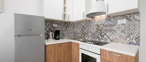 Apartment | Private kitchen | Fridge, oven, stovetop, dishwasher