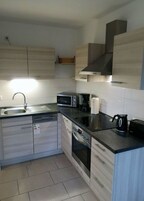 Casa | Cocina privada | Hervidor eléctrico y tostadora