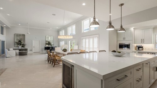 Spacious three-bedroom and two-bath home on the water with heated pool and spa