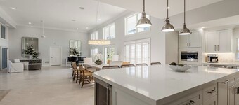 Spacious three-bedroom and two-bath home on the water with heated pool and spa