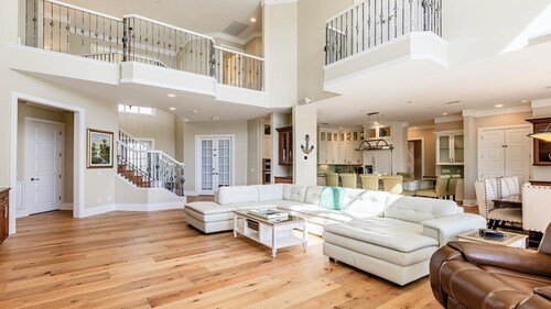 This expansive home has seven bedrooms and five bathrooms. It is perfect for a family getaway or family reunion.