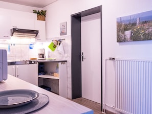 Casa | Cocina privada | Tetera eléctrica, tostadora y periquera 