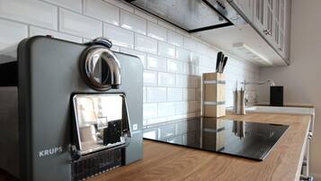 Apartment | Private kitchen | Oven, electric kettle, toaster