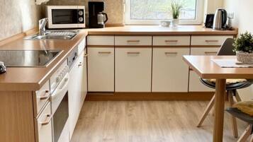 Apartment | Private kitchen | Oven, electric kettle, toaster