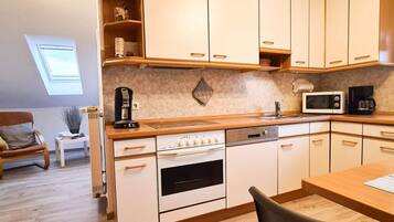 Apartment | Private kitchen | Oven, electric kettle, toaster