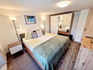 2 habitaciones, muebles diferentes y ropa de cama 